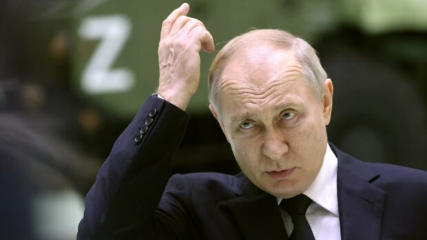 путін